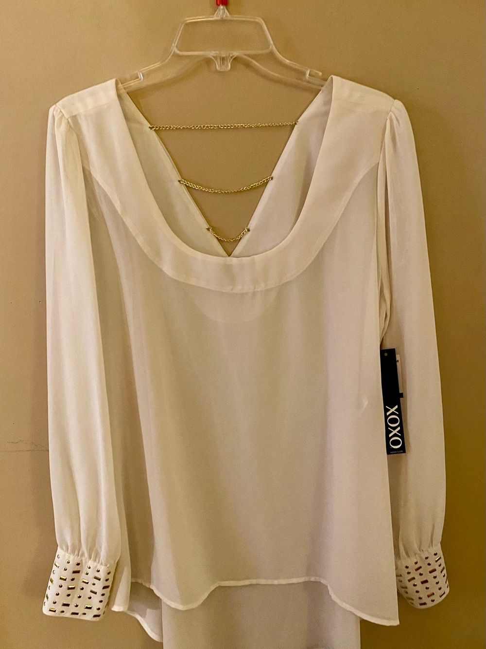 XOXO Ivory Long-Sleeve Blouse with Gold Cuff Designs & Back Gold Chain Detail